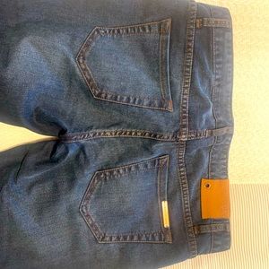 Armani Exchange skinny jeans.